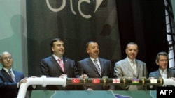 Azerbaijani President Ilham Aliyev (center) at the opening ceremony for the Baku-Tbilisi-Ceyhan (BTC) pipeline in 2006.