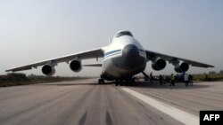 Російський Ан-124 з гуманітарною допомогою розвантажується у сирійській провінції Латакія, 12 вересня 2015 року