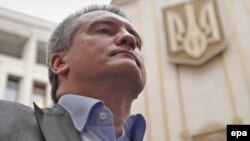 “Supply the homes that are entirely dependent on electric power, and supply the other ones using generators under a separate scheme. Do it! We’ve said this 100 times. (Expletive) No damn thing is working anywhere,” Sergei Aksyonov said. (file photo)