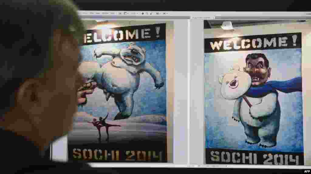 A computer screen shows images of Vasily Slonov&#39;s satirical posters, one of which depicts a fanged Josef Stalin disguised as a friendly bear. 