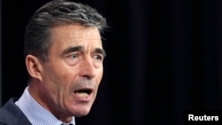 NATO Secretary-General Anders Fogh Rasmussen addresses a news conference during a NATO foreign ministers meeting at the alliance's headquarters in Brussels on April 1.