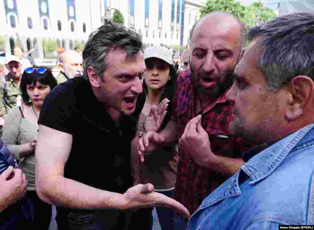 People argue over the influence of political parties in the current unrest in Tbilisi.