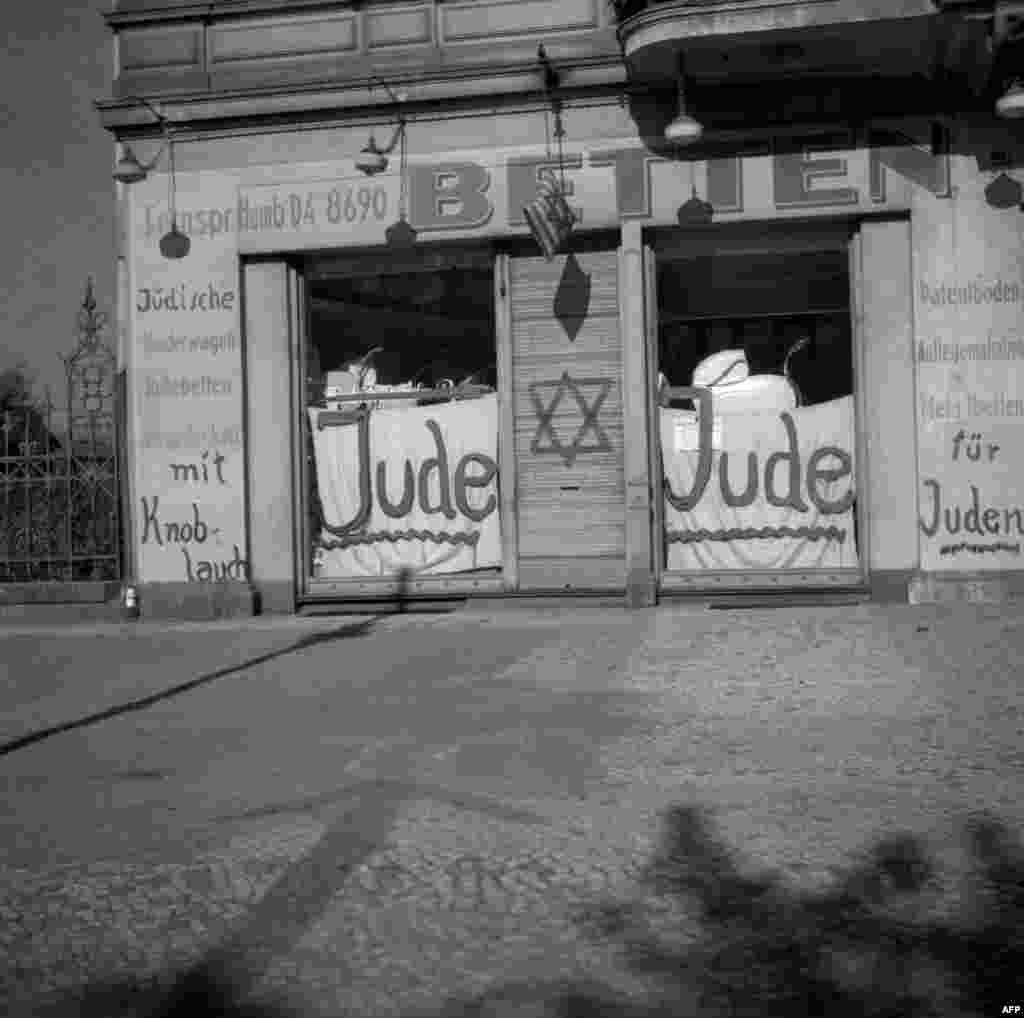 A Jewish-run shop in Berlin after being vandalized and covered with anti-Semitic graffiti, November 10, 1938.