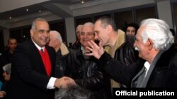 Armenia - Opposition leader Raffi Hovannisian greets supporters after delivering a speech in Yerevan, 18Feb2014.