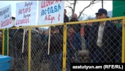 Armenia - Employees of a mining company demonstrate against environmentalists at Teghut forest, 15Jan2012.