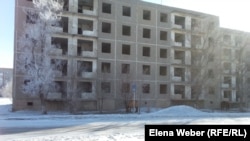 Dozens of five-story apartment blocks have been abandoned in the town of 8,600, and many use improvised stoves to heat their apartments.