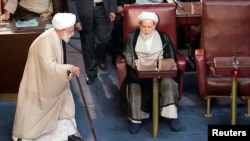 Ahmad Jannati (L), the head of Iran's Assembly of Experts, attends the Assembly meeting in Tehran, May 24, 2016