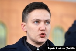 Lawmaker Nadia Savchenko talks to reporters outside the Ukrainian Security Service's headquarters on March 15.