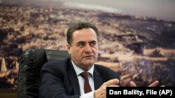In this March 7, 2017 file photo, Israel's transportation and intelligence minister Yisrael Katz speaks during an interview with The Associated Press, in his office in Tel Aviv, Israel.