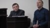 Слева-направо: адвокат Александр Клюкин и его подзащитный Виталий Мельник. 