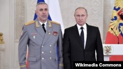Рөстәм Мурадов һәм Владимир Путин (Архив фотосы)