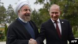دیدار حسن روحانی، رئیس جمهور ایران با ولادیمیر پوتین، همتای روس خود در آستراخان