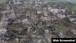 The village of Novotoshkivske in Ukraine's Luhansk region after prolonged strikes by Russian forces in April 2022. 