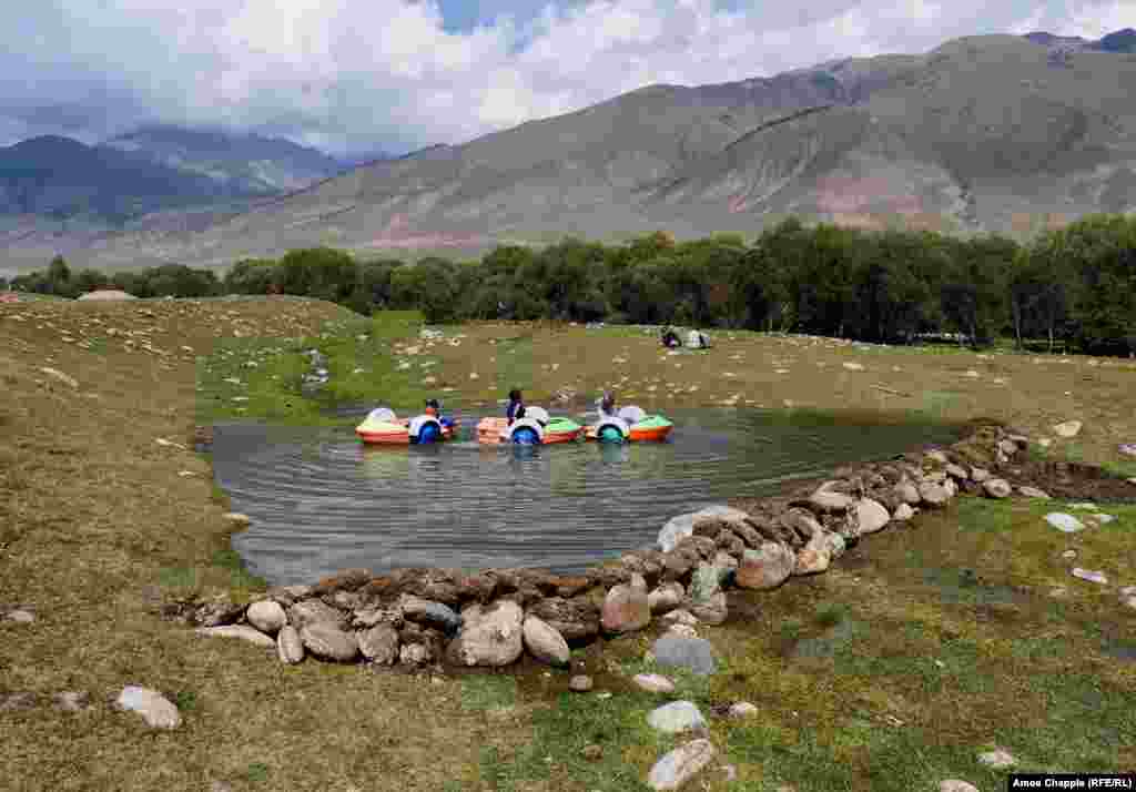 As the opening ceremony drew to a loudly applauded close, VIPs choppered out of the gorge and locals tried out other entertainment, including this man-made lakelet.