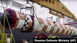 Russia's Poseidon nuclear-powered underwater drone is seen being test-launched somewhere in Russia.