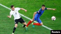 Германия мен Франция матчынан көрініс. 