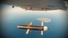 Egy Sahed 171-es drón bombát dob le egy hadgyakorlaton az öböl felett 2019. szeptember 23-án