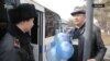 On March 22, 2018, RFE/RL correspondents witnessed several incidents in Astana's central square in which people holding blue balloons were stopped and forced to go police buses. 