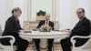 Merkel, Hollande Talk Peace With Putin