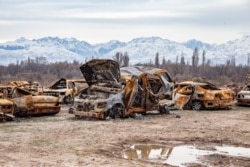 Сгоревшие автомобили в селе Масанчи, Жамбылская область. 26 февраля 2020 года.