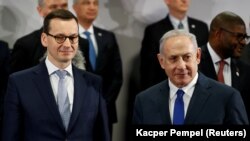 Kryeministri polak, Mateusz Morawiecki dhe ai izraelit, Benjamin Netanjahu gjatë samitit në Varshavë. 14 shkurt, 2019.