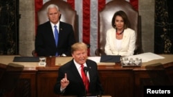 Vice President Mike Pence and Speaker of the House Nancy Pelosi (D-CA) listen as U.S. President Donald Trump delivers his second State of the Union address to a joint session of the U.S. Congress in the House Chamber of the U.S. Capitol on Capitol Hill in