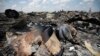 War Crime Question Hovers Over Malaysian Airliner Tragedy