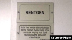 Rentgen kabinetinin önündə yazılmış löhvə