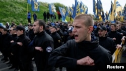 Members of the Ukrainian Interior Ministry's Azov Battalion demonstrate in Kyiv.