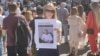 Katsyaryna Savitskaya eventually found her husband by showing his picture to protesters released by the police.