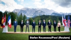 G7 and EU leaders pose for a family photo during the summit at Bavaria's Schloss Elmau castle, near Garmisch-Partenkirchen, Germany, on June 26.