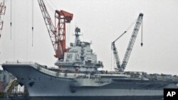 China had long refused to acknowledge its work at Darian on the aircraft carrier known in Ukraine as the "Varyag," seen here in an April 2011 photograph from northeastern China.