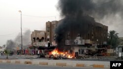 Bombings such as this car bomb in Talibiya in Baghdad are standard procedure in Sunni-Shi'ite violence (file photo)