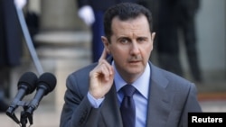 Сирия президенті Башар Асад Парижде журналистер сұрағына жауап беріп отыр. 9 желтоқсан 2010 жыл