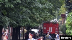 Police guard the street where a blast rocked a cafe in the city of Pyatigorsk on August 17.