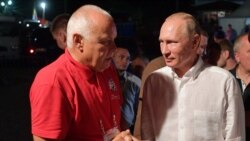 Російський телеведучий Кисельов з Путіним