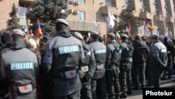 Armenia - Riot police deployed during an anti-government demonstration in Yerevan, 6Feb2014.