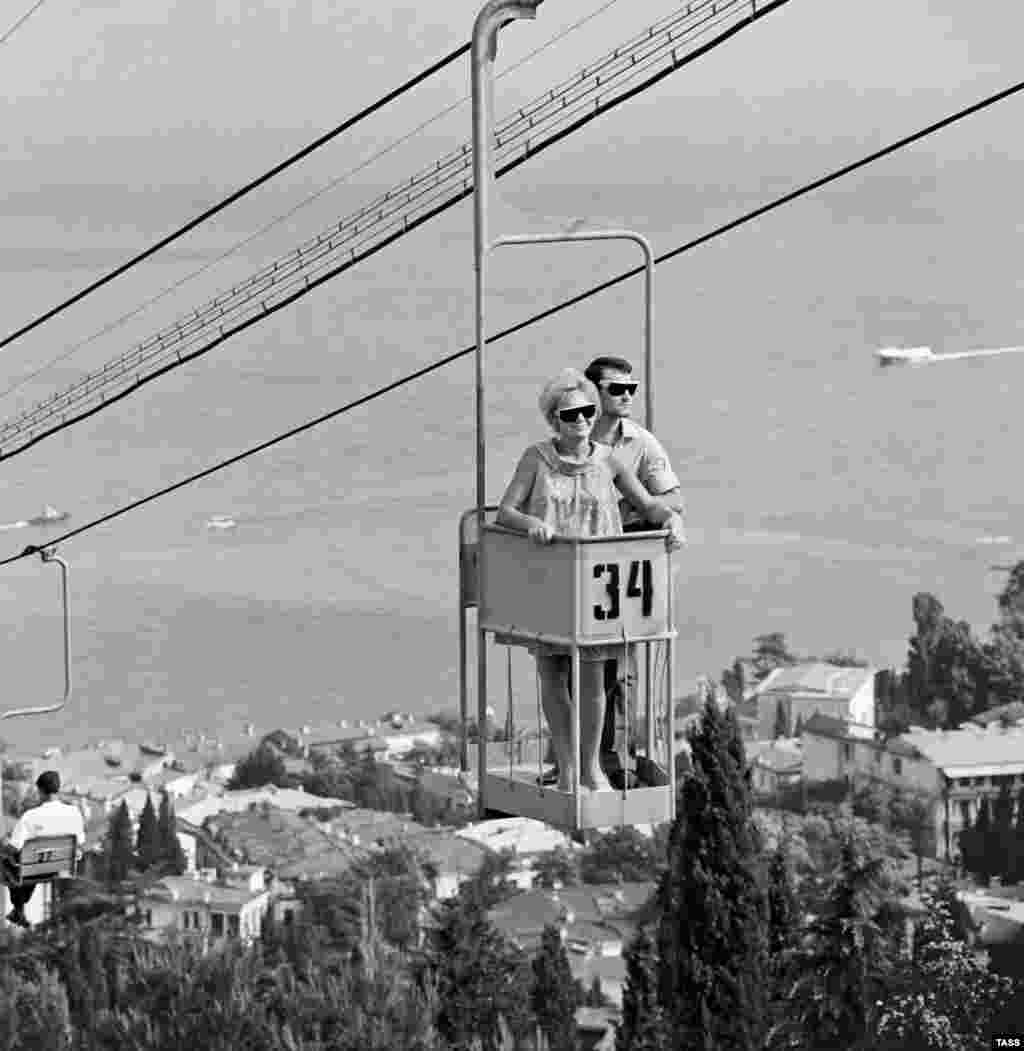 Vacationers enjoy a low-frills aerial lift in Yalta, 1968.