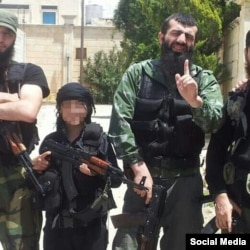 The 12-year-old son of Chechen militant Seyfullakh al-Shishani (right) has reportedly joined IS.