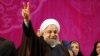 Iranian President Hassan Rohani gestures during a campaign rally in Tehran, May 9, 2017