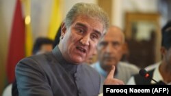 Pakistani Foreign Minister Shah Mahmood Qureshi addresses the media on his first day at the Foreign Ministry in Islamabad on August 20.