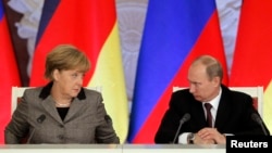 Концлер Германии Ангела Меркель и президент России Владимир Путин.