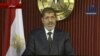 نخست وزیر مصر:‌ مرسی با تعديل فرمان رياست جمهوری خود موافقت کرد