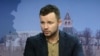 Lawyer: Belarusian-American Political Strategist Jailed In Minsk Needs Medical Assistance