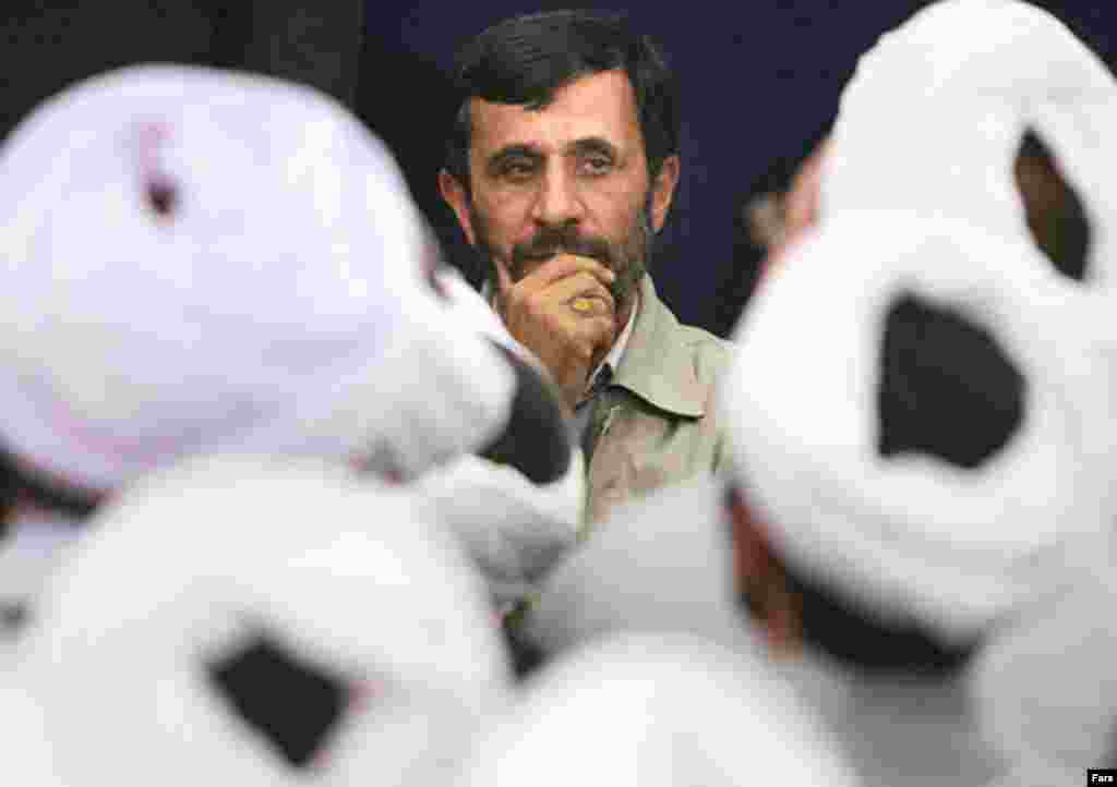 Iranian President Mahmud Ahamadinejad meets clerics (Fars) - Among the year's most familiar faces was that of Iranian President Mahmud Ahmadinejad. His controversial statements -- including calls for Israel to be "wiped off the map" -- were one reason, but the principal factor was the dispute over Iran's nuclear activities. The UN toughened its line, but has stopped short of sanctions. Ahmadinejad will, it seems, be one of the personalities of 2007 as well.