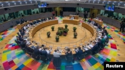 EU leaders take part in a European Union summit in Brussels on June 28.