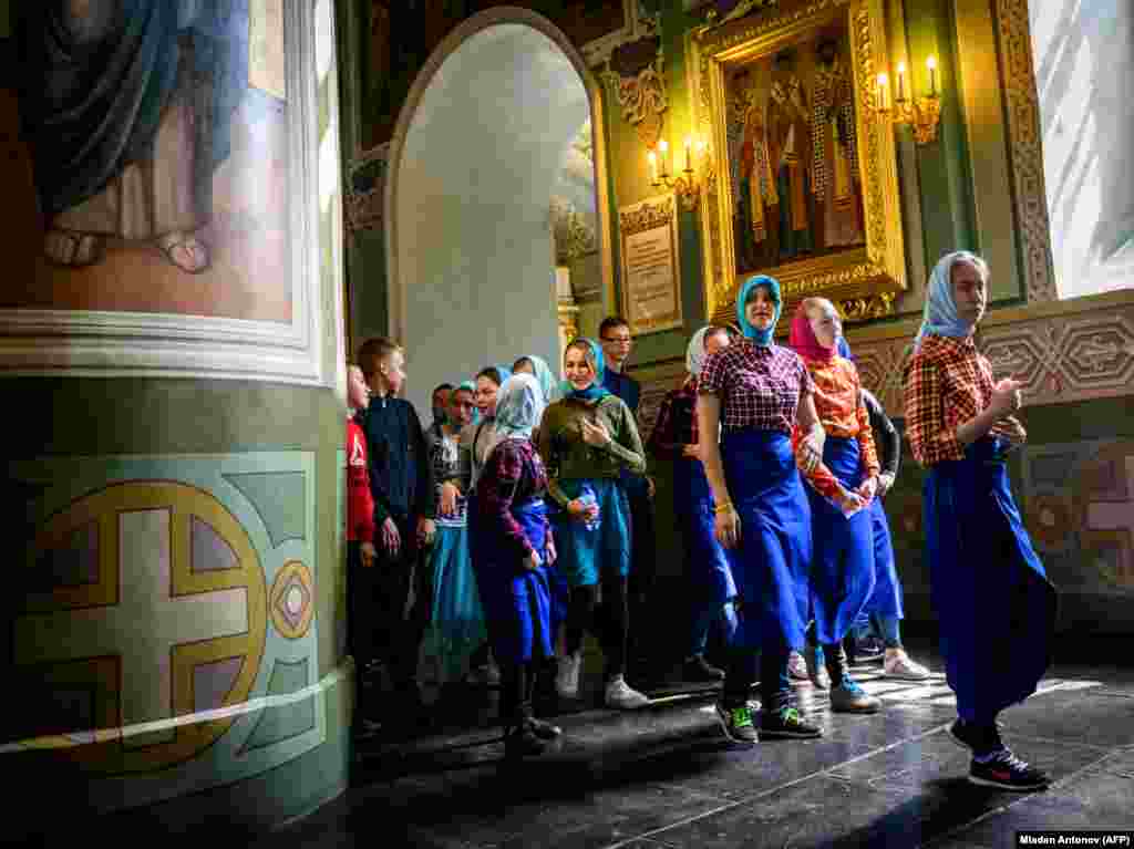 A group of schoolchildren visits a church in the Kremlin in the Russian city of Kazan. (AFP/Mladen Antonov)