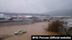 The scene at the dam collapse in Krasnoyarsk Krai.