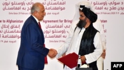 امضای توافقنامه دوحه میان نماینده های ایالات متحده آمریکا و گروه طالبان در دوحه پایتخت قطر