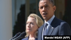 Former U.S. Secretary of State Hillary Clinton and ex-U.S. President Barack Obama (file photo)